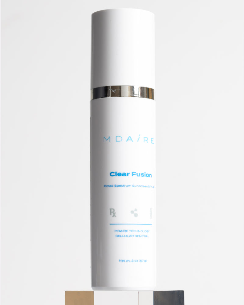 Total Protection SPF Duo showing sleek Clear Fusion sunscreen bottle with silver band in gallery position 1